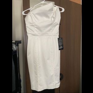 Bebe size 6 strapless white dress. New with tags.